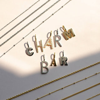 The Sis Kiss - Solid Initial Charm Gold